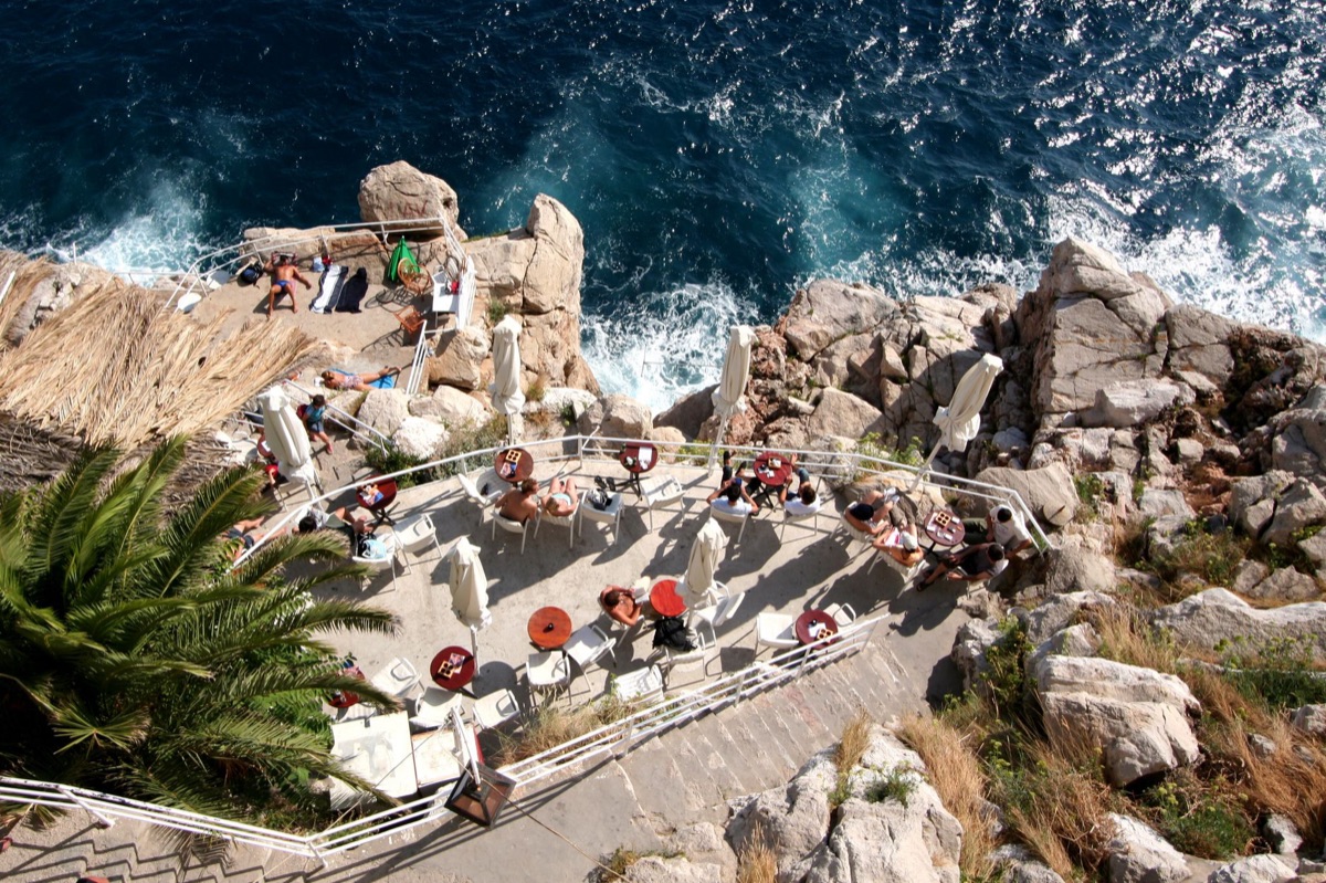 A scenic ocean view from a modern seaside cafe in Jeju