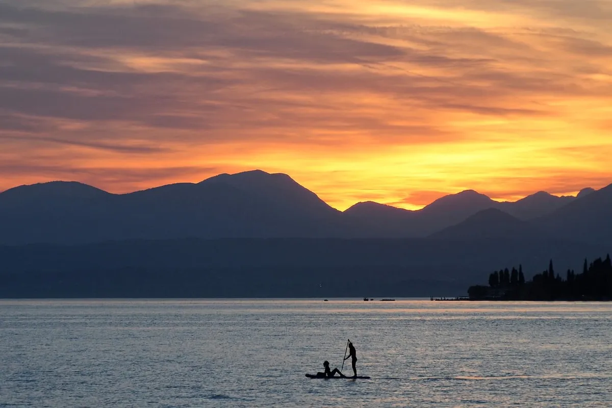sunset, lake, couple, paddling, dusk, romantic, red sky, mountains, silhouette, water sport, tranquility, nature, blue, evening, rowing, silence, evening sky, c